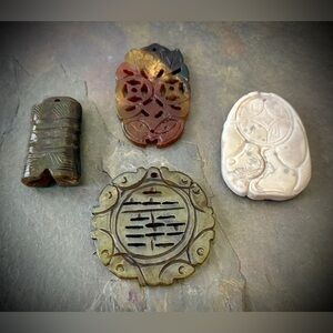 Set of Four Jade Carved Stone Pendants
